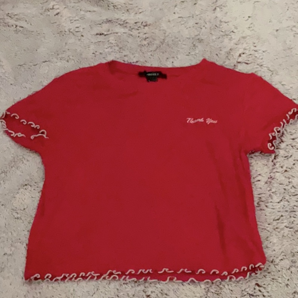 red “thank you” shirt